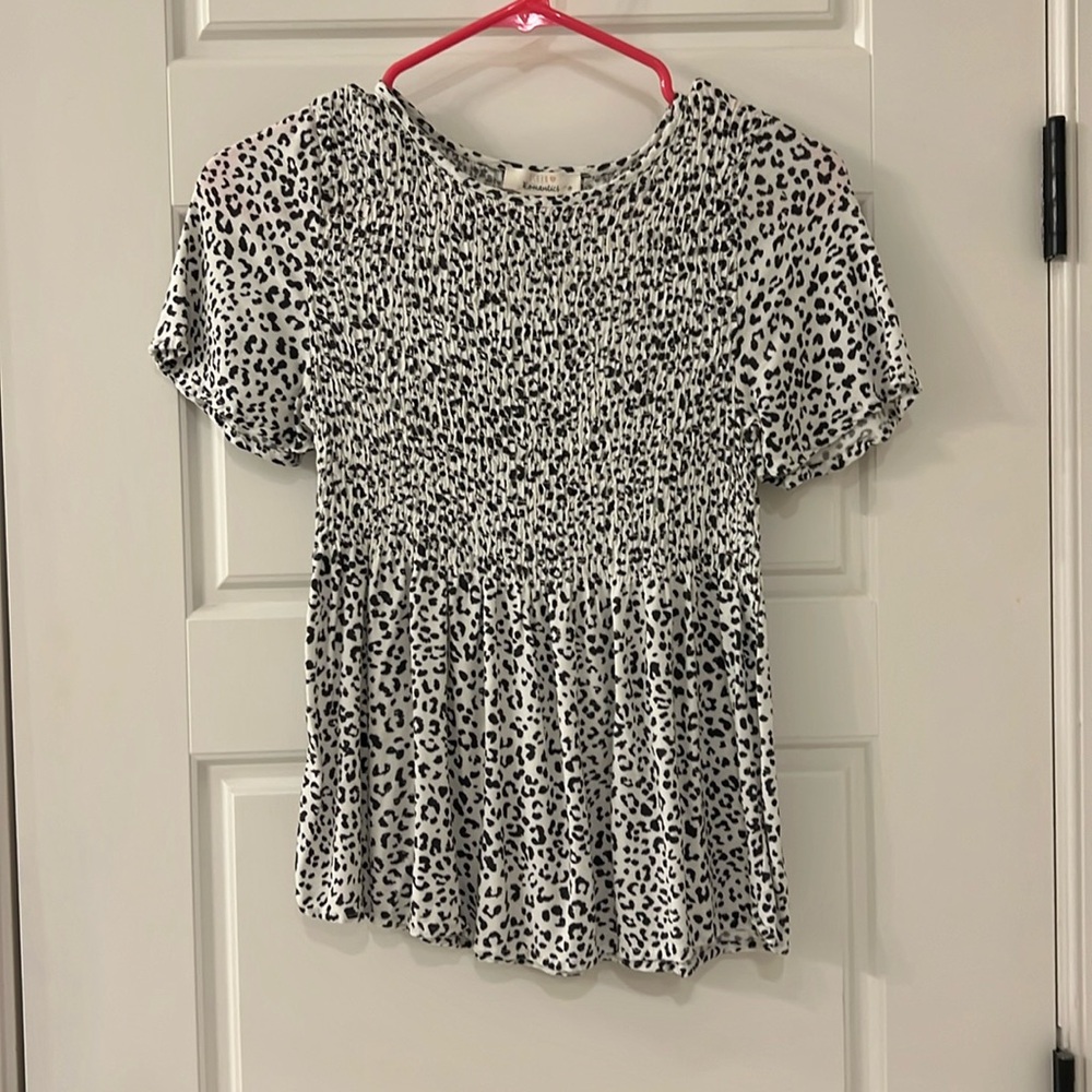 Black and white cheetah peplum shirt